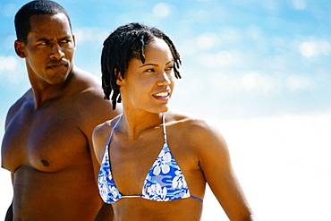 Side view of a couple in swimsuit , Horse-shoe Bay beach, Bermuda