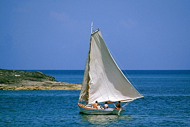 Small group of people traveling in boats in a vast sea, Nassau, Bahamas