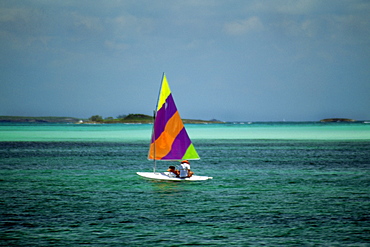 A colorful sailboat on the tranquil sea, Treasure Island, Abaco, Bahamas