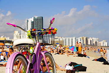 Close-up of a bicycle on the beach