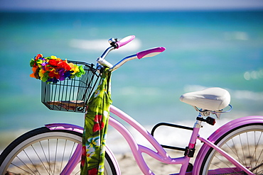 Close-up of a bicycle on the beach