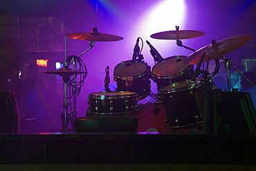 Spotlight on a drum kit in a nightclub, New Orleans, Louisiana, USA