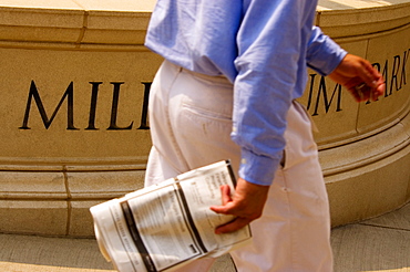 Mid section view of a man walking in the park, Millennium Park, Chicago, Illinois, USA