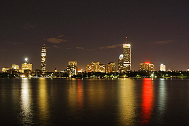 Buildings at the waterfront lit up at night, Boston, Massachusetts, USA