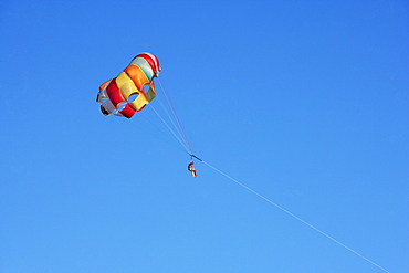 Low angle view of a person parasailing, Miami, Florida, USA