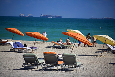 Group of people sunbathing on the beach, Miami, Florida, USA