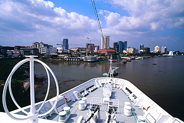 Saigon river and city skyline from cruise ship, Vietnam