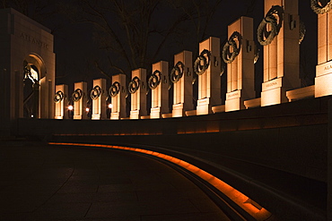 Memorial lit up at night, World War II, Washington DC, USA