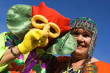 Portrait of a senior woman with an another woman wearing a costume