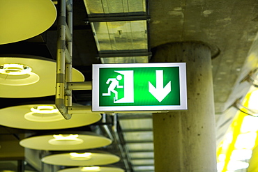 Close-up of an emergency exit sign at an airport, Madrid, Spain