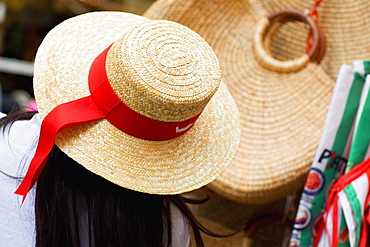 Rear view of a woman at a market stall