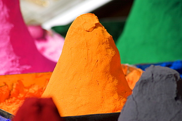 Close-up of mounds of colored powder used for Hindu rituals, Pushkar, Rajasthan, India