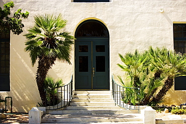 Arched doorway in a stucco building, San Diego, California, USA