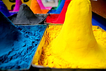 Close-up of mounds of colored powder used for Hindu rituals, Pushkar, Rajasthan, India