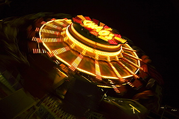 Ride in an amusement park at night, San Diego, California, USA