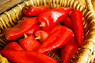 Close-up of artificial chilies in a basket, San Diego, California, USA