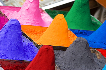 Close-up of mounds of colored powder used for Hindu rituals, Pushkar, Rajasthan, India