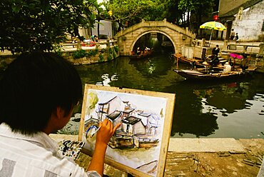 Rear view of a man painting, Tongli, Jiangsu Province, China