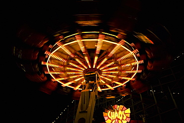 Ride in an amusement park at night, San Diego, California, USA