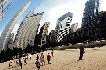 Low angle view of skyscrapers in a city, Cloud Gate Sculpture, Chicago, Illinois, USA