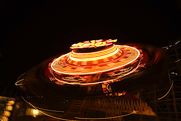 Ride in an amusement park at night, San Diego, California, USA