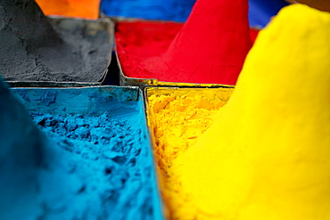 Close-up of mounds of colored powder used for Hindu rituals, Pushkar, Rajasthan, India