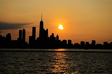 Buildings on a waterfront at sunset, Chicago, Illinois, USA