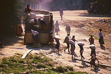 High angle view of manual workers loading a truck, Sagaing, Myanmar