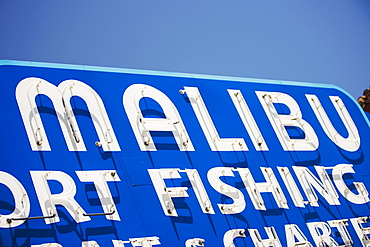 Close-up of a Malibu Fishing Charters sign, Malibu, California, USA