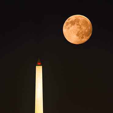 Low angle view of the moon above a tower, Washington Monument, Washington DC, USA