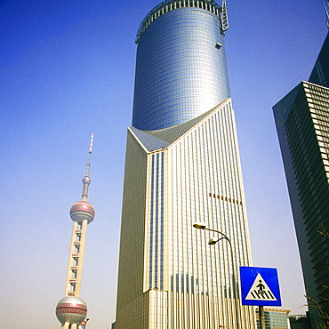 Low angle view of buildings in a city, Pudong, Shanghai, China