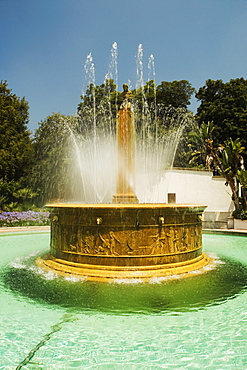 Ornate stone fountain spouting water