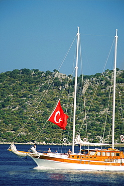 Turkish flag on a sailboat in the sea, Turkey