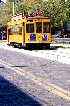 Tram moving in a city, Ybor City, Tampa, Florida, USA