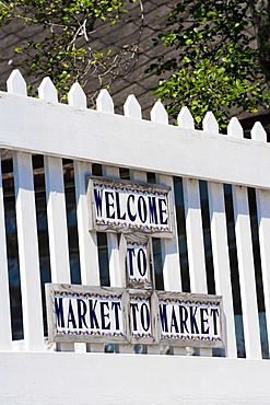 Welcome sign on a picket fence, St. George Street, St. Augustine, Florida, USA