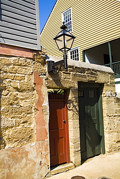 Lantern mounted on the wall of a house