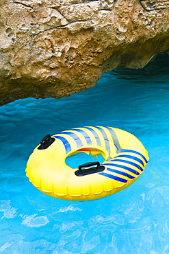 Inflatable ring floating on water, Cable Beach, Nassau, Bahamas