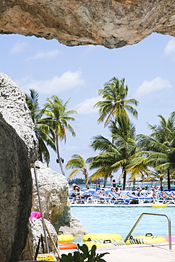 Tourists relaxing in a tourist resort, Cable Beach, Nassau, Bahamas