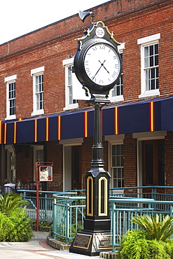 Clock in front of a building, Savannah, Georgia, USA