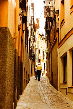 Tourists walking on the street, Toledo, Spain