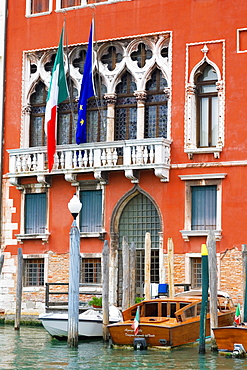 Boats docked in a canal, Venice, Italy
