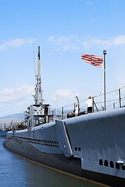 American flag fluttering on a military ship, USS Bowfin, Pearl Harbor, Honolulu, Oahu, Hawaii Islands, USA