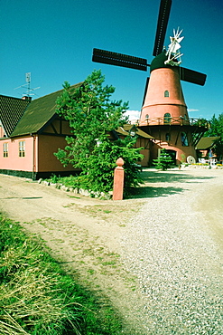 Windmill and a restaurant on a country road, Funen County, Denmark