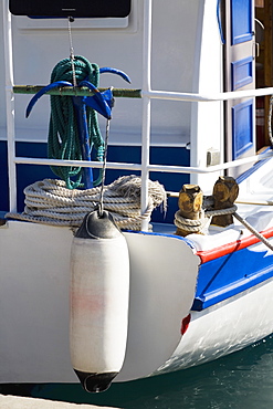 Anchor on the railing of a yacht, Patmos, Dodecanese Islands, Greece