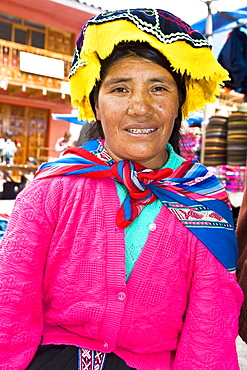 Portrait of a mid adult woman sitting and smiling, Peru