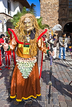 Person wearing a traditional costume in a festival, Peru