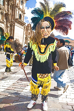 Person wearing a traditional costume in a festival, Peru