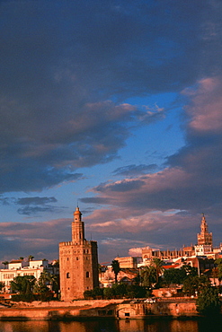 Towers in a city, Gold Tower, La Giralda, Seville, Spain