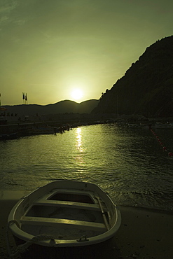 Boat in a river at sunset, Italian Riviera, Cinque Terre National Park, Il Porticciolo, Vernazza, La Spezia, Liguria, Italy