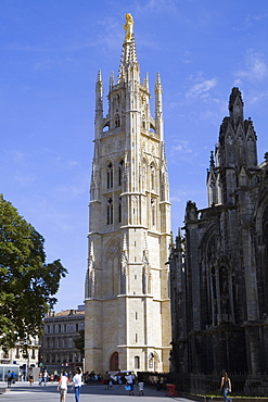 Tourists at a church, St. Andre Cathedral, Tour Pey Berland, Bordeaux, Aquitaine, France